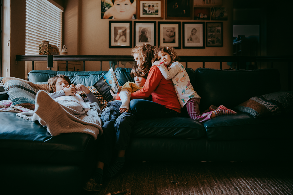 Beth reads Carry On, Mr. Bowditch (Sonlight Level D) to Caleb (11) and Isaac (8), while little sister Eliana (3) listens in. The C family has been homeschooling for 11 years, and have used Sonlight from the beginning. • 1st Place Sonlight 2018 catalog cover contest 