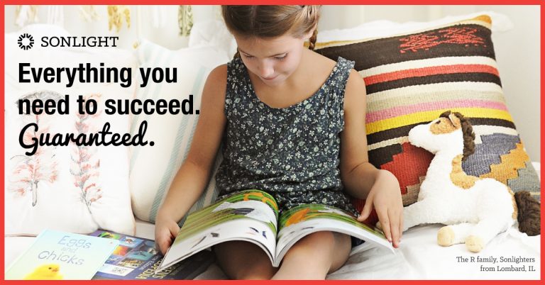 girl reading on her bed