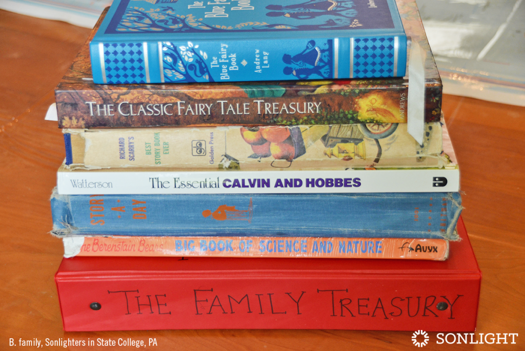 How to Create a Family Anthology of Your Child’s Creations • The Family Treasury shown in a stack with other favorite volumes.