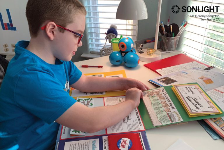 A student works on the Election Lap Book