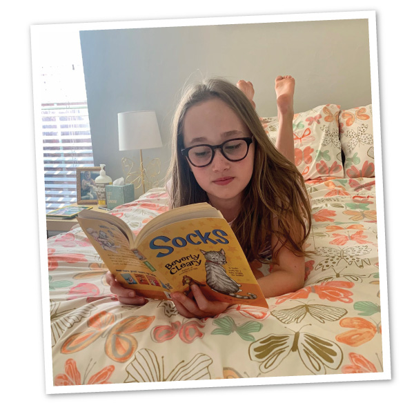 Smith's daughter reading a book.